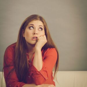 woman in red annoyed