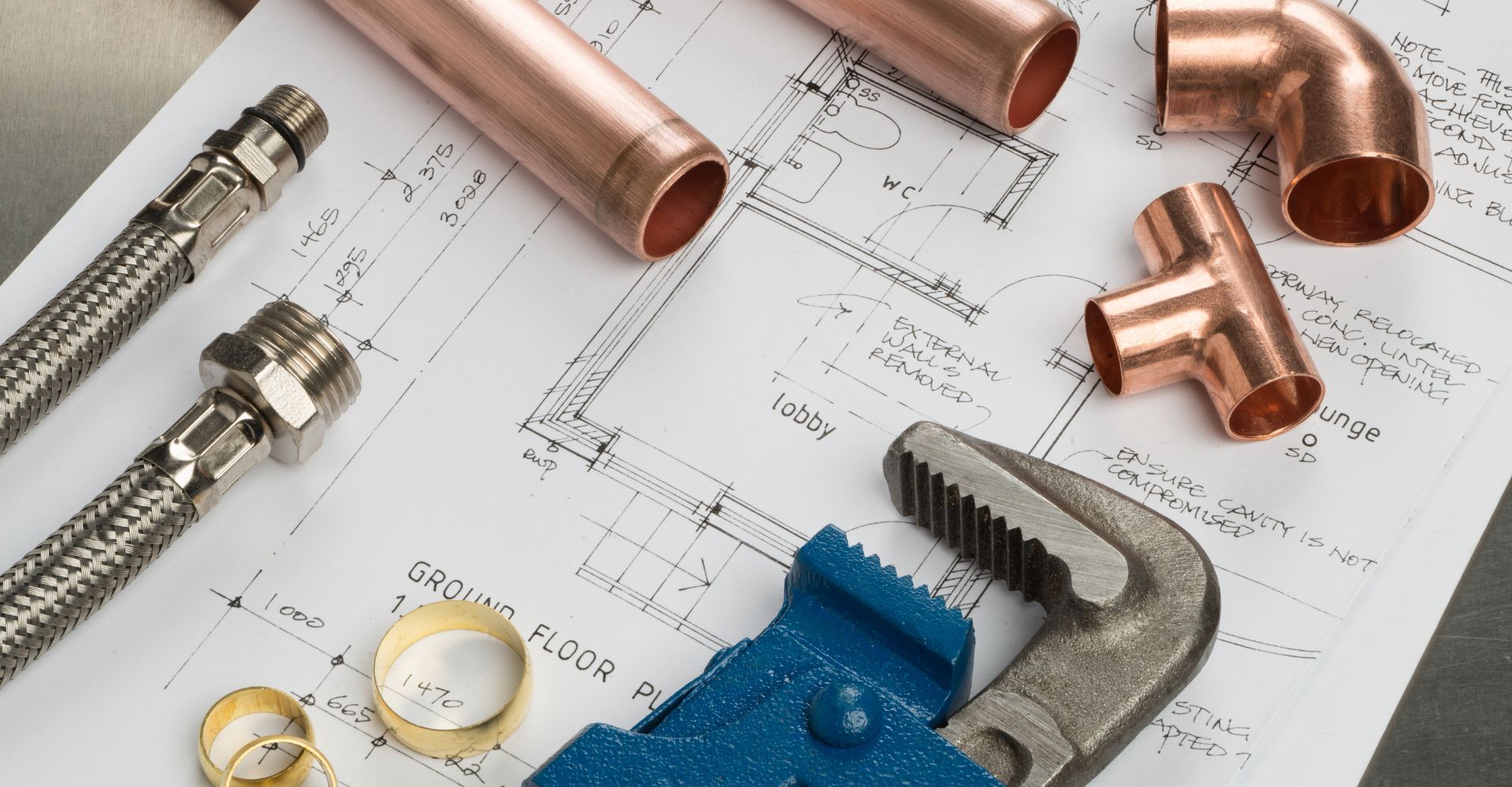 An image of plumbing tools on a piece of paper.