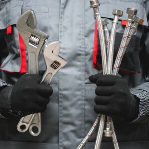 plumber with tools and equipment
