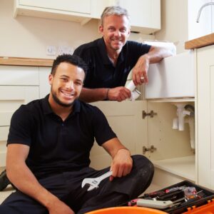 smiling plumbers