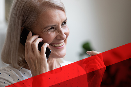 a woman happily on a call