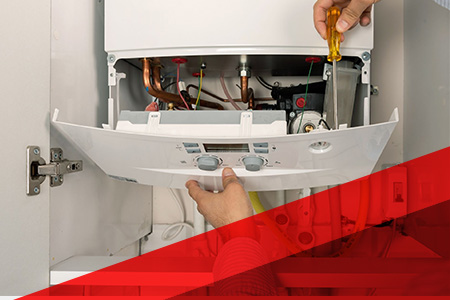 person repairing furnace