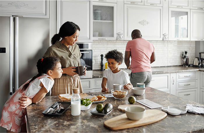 family spending time in their kitchen