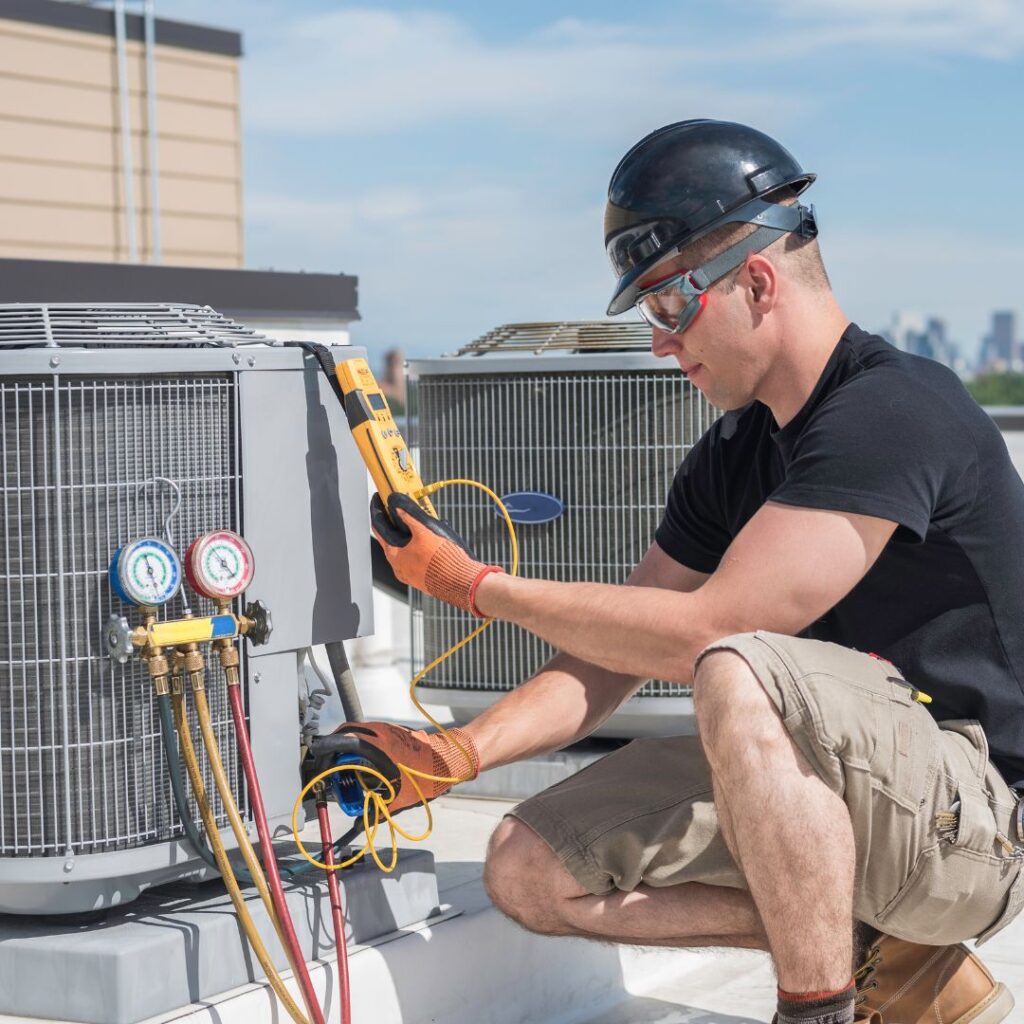 technician diagnosing an ac system