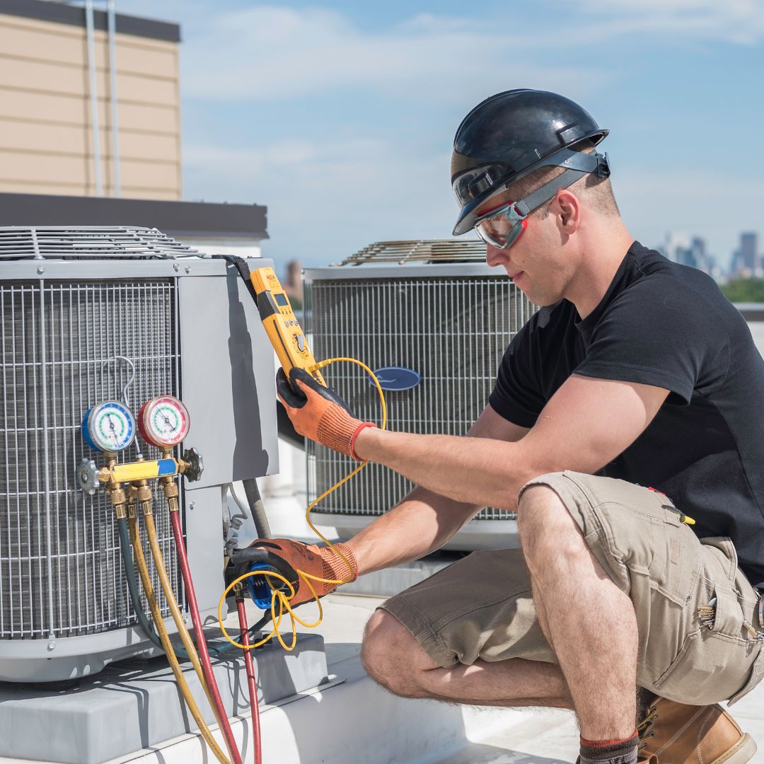 technician diagnosing an ac system
