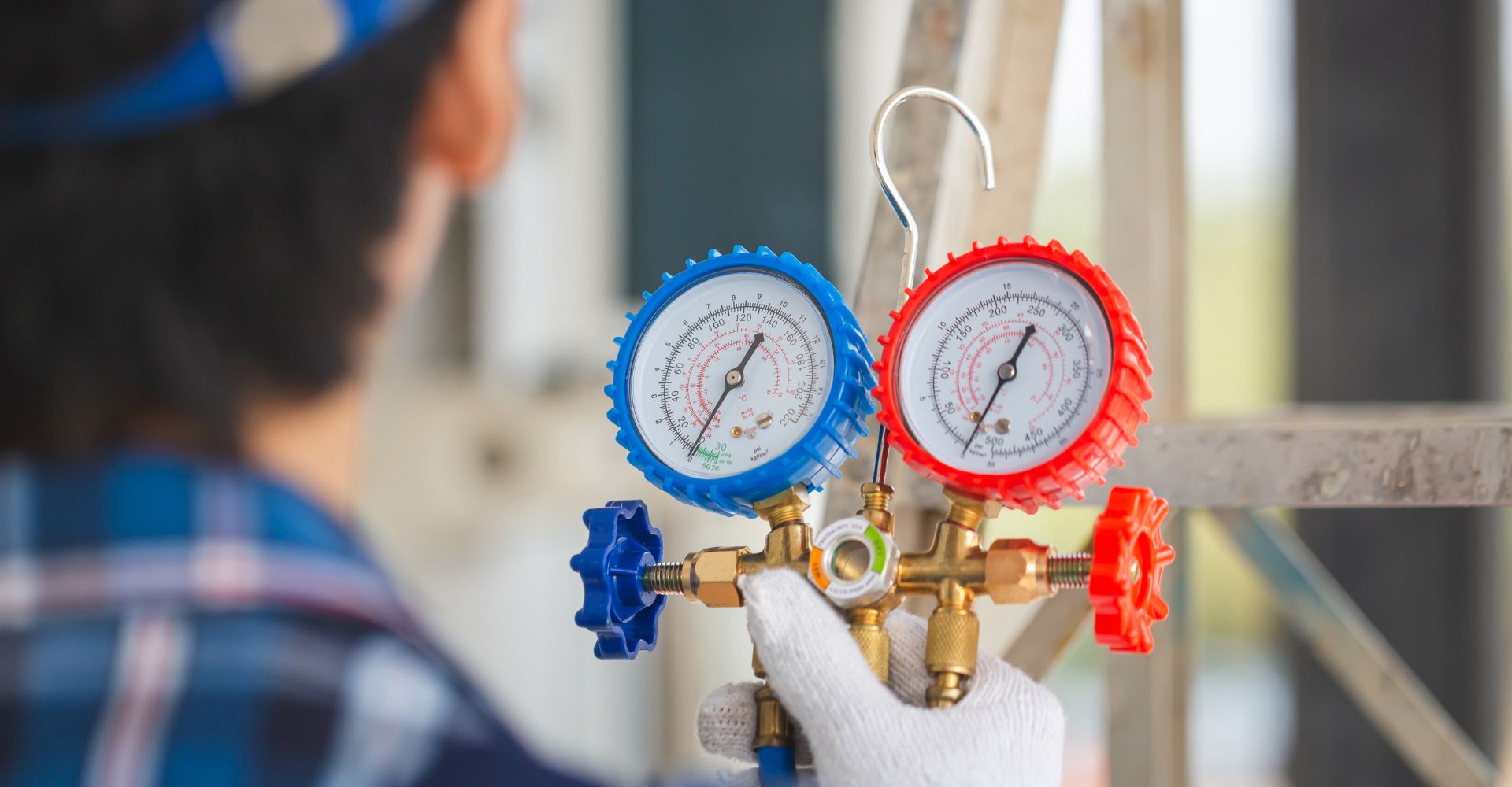 a repairman checking coolant levels