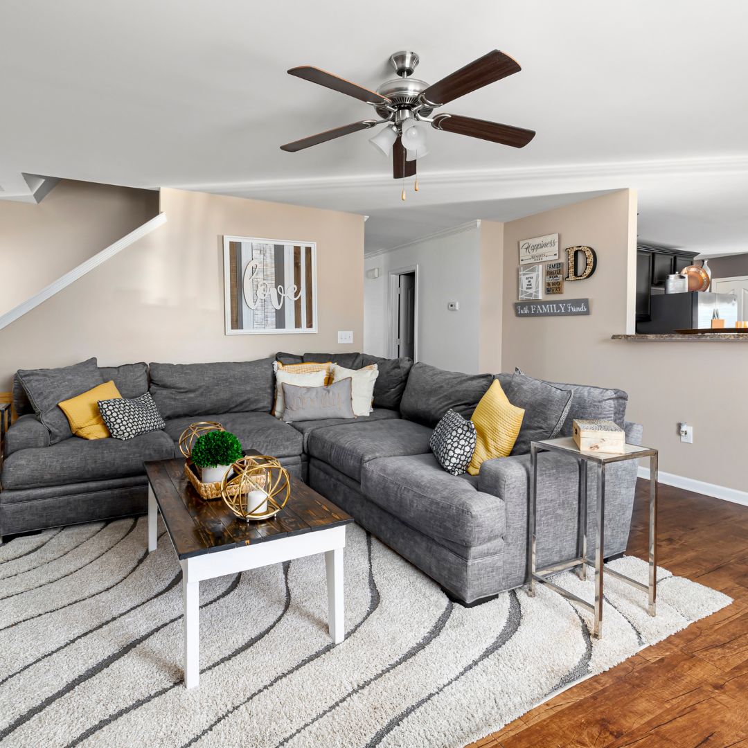 living room with ceiling fan