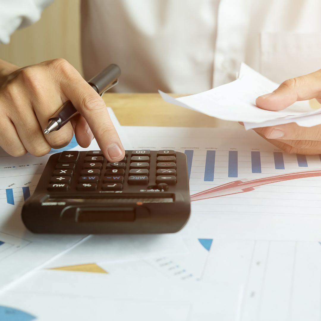 person calculating energy bill