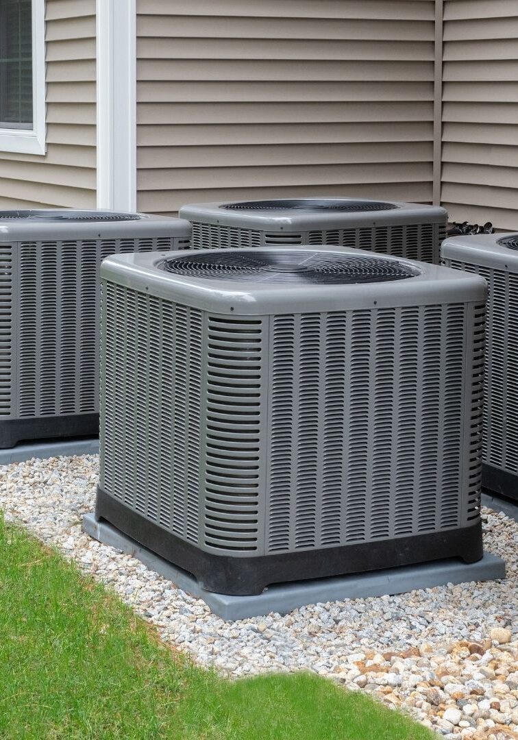 4 AC cabinets outside a building